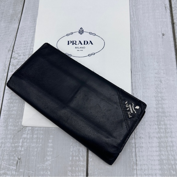 AUTHENTIC Prada wallet in black. - Picture 1 of 16